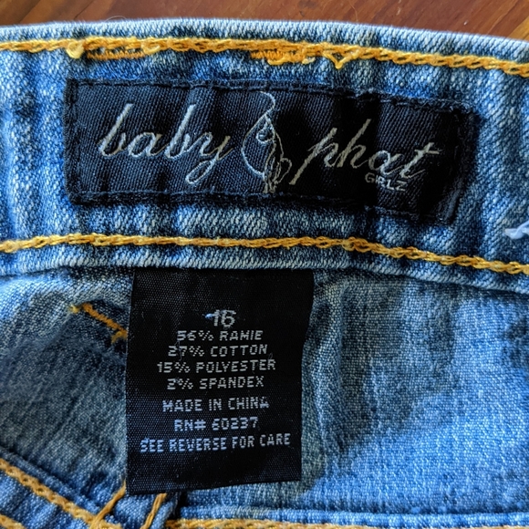 Baby Phat Jeans in a size 16 child.  I'm a 3/4, they fit me perfectly. - Picture 2 of 6